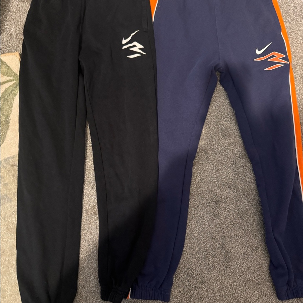 4 pair Nike Green, Blue, and Navy jogging pants